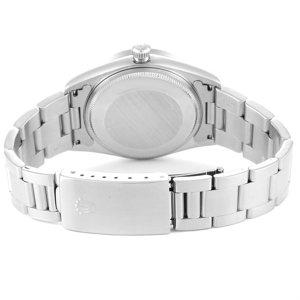 The image shows the back view of a Rolex Air-King 14010 Men's Stainless Steel Grey Dial 14010 Men's Stainless Steel Grey Dial watch, focusing on the case back and the bracelet with the clasp open.