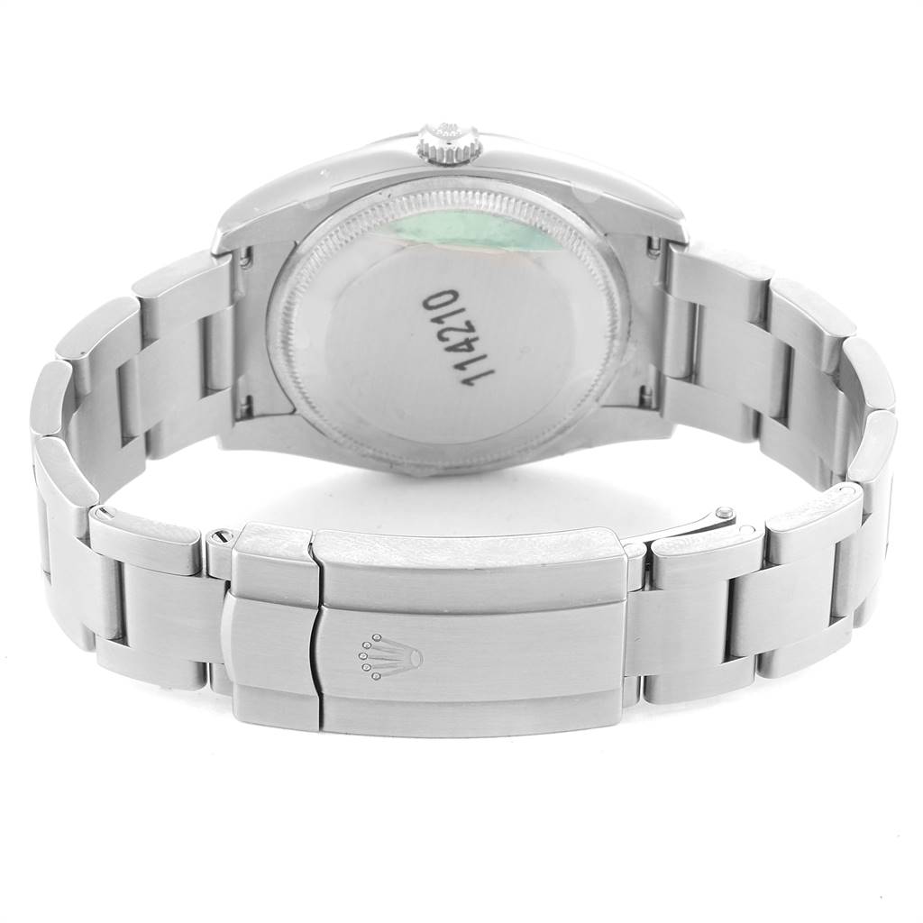 This image shows the back view of a Rolex Air-King 114210 Men's Stainless Steel Silver Dial 114210 Men's Stainless Steel Silver Dial watch, displaying its case back and bracelet with the clasp open.