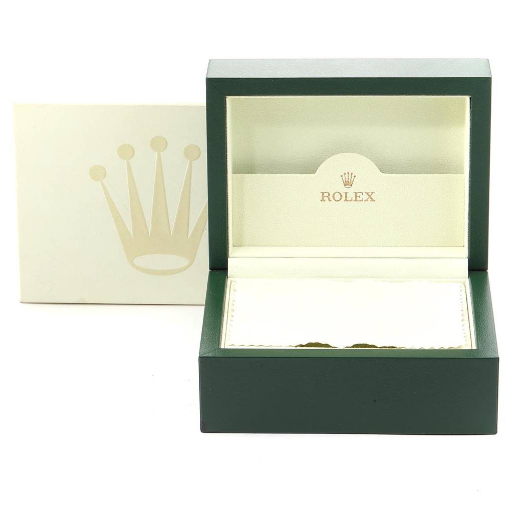 This image shows an empty green and beige Rolex box for the Air-King model.