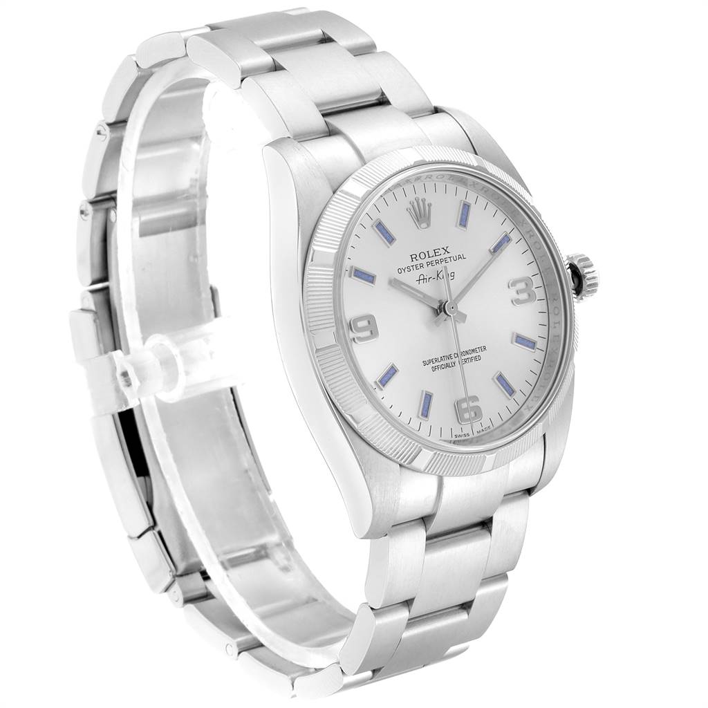 The Rolex Air-King 114210 Men's Stainless Steel Silver Dial 114210 Men's Stainless Steel Silver Dial watch is shown at an angled view, displaying its bracelet, dial, case, and crown.