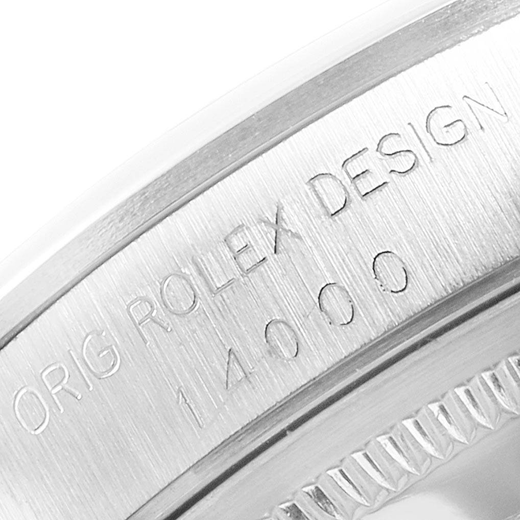 The image shows a close-up of the engraved bezel of a Rolex Air-King 14000 Men's Stainless Steel Black Dial 14000 Men's Stainless Steel Black Dial watch, displaying the model and design numbers.