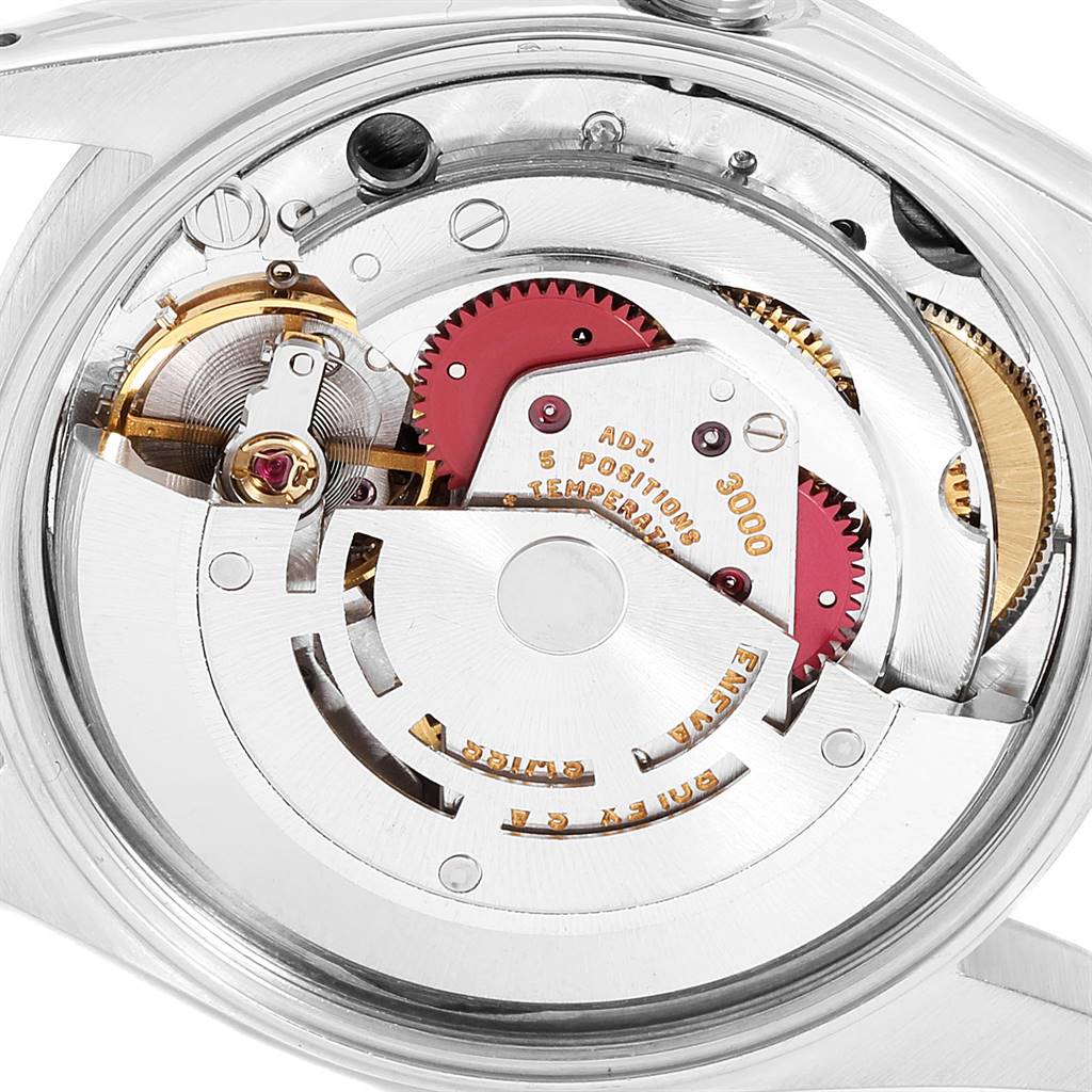 The image shows the intricate internal mechanism of the Rolex Air-King 14000 Men's Stainless Steel Black Dial 14000 Men's Stainless Steel Black Dial model from a top-down angle, showcasing gears and components.