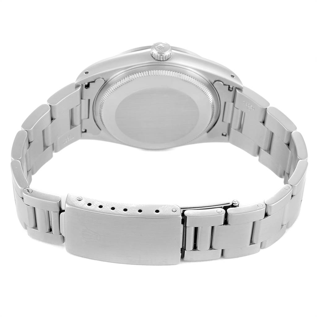 The image shows the underside of the Rolex Air-King 14000 Men's Stainless Steel Black Dial 14000 Men's Stainless Steel Black Dial watch, highlighting its back cover and the metal bracelet with clasp.