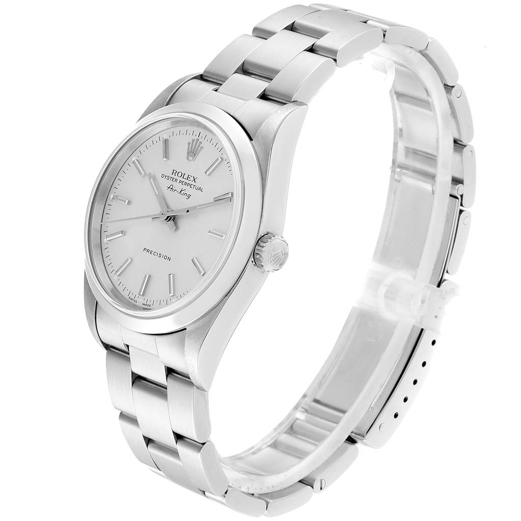 The Air-King by Rolex is shown at a slight side angle, displaying the face, bezel, crown, and bracelet.