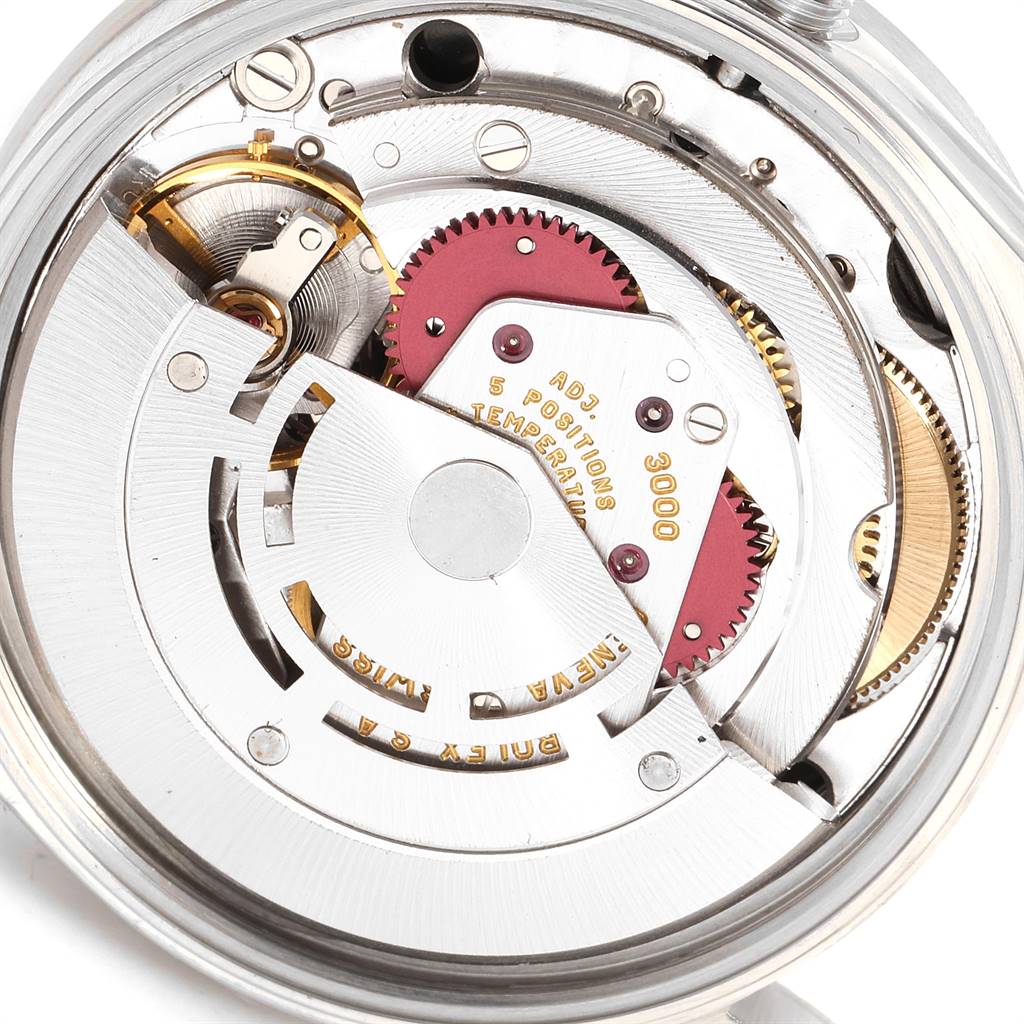 The image shows the back view of the Rolex Air-King 14010 Men's Stainless Steel Black Dial 14010 Men's Stainless Steel Black Dial model, revealing its intricate internal movement mechanisms.