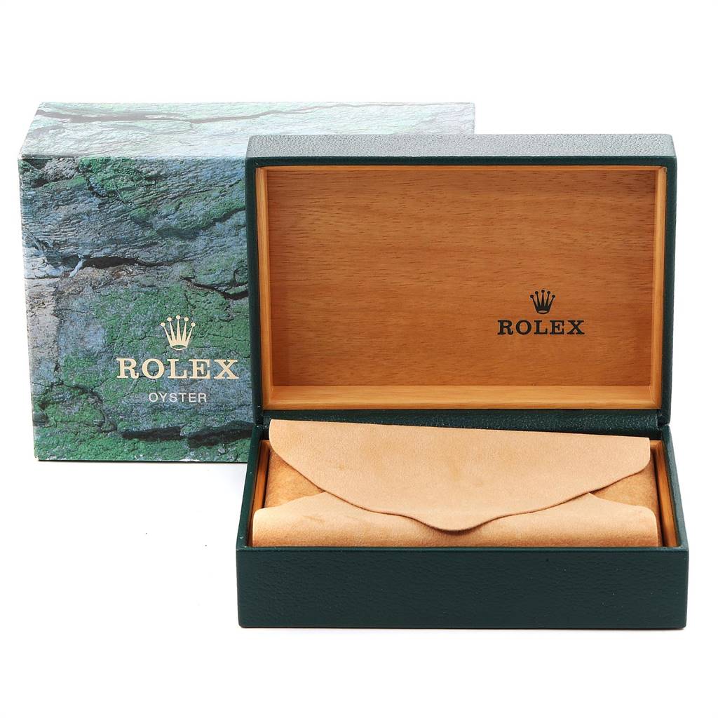 The image shows an opened wooden Rolex Air-King 14010 Men's Stainless Steel Black Dial 14010 Men's Stainless Steel Black Dial box with a beige leather pouch and a green textured outer box.