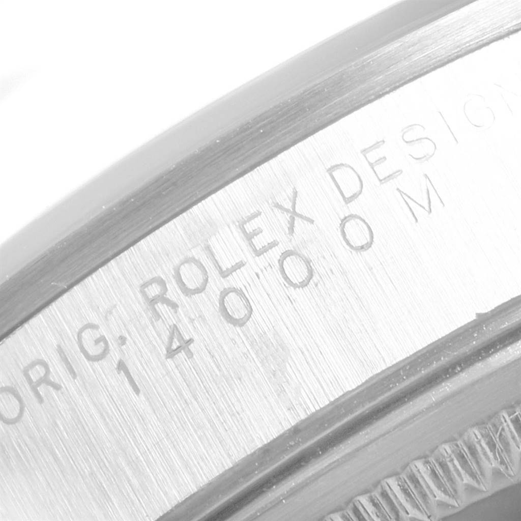 This image shows a close-up view of the engraved bezel on a Rolex Air-King 14000 Men's Stainless Steel Silver Dial 14000 Men's Stainless Steel Silver Dial watch.