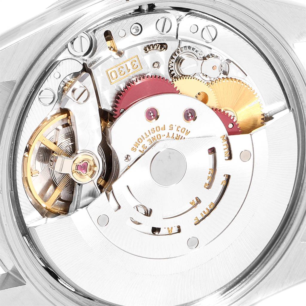 This image shows the internal movement and intricate mechanical components of a Rolex Air-King 14000 Men's Stainless Steel Silver Dial 14000 Men's Stainless Steel Silver Dial watch from a close-up angle.