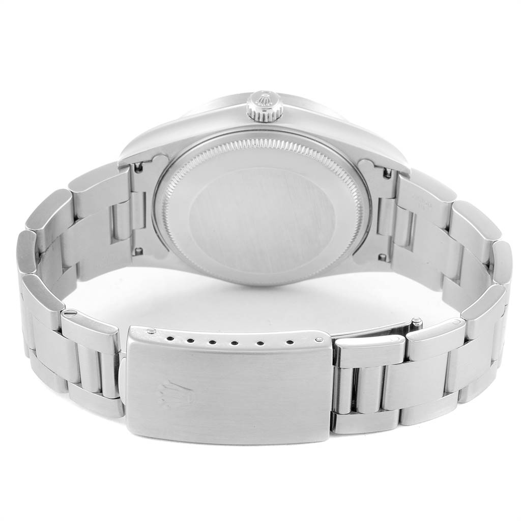 This image shows the back case, crown, and bracelet with clasp of a Rolex Air-King 14010 Men's Stainless Steel Black Dial 14010 Men's Stainless Steel Black Dial watch.