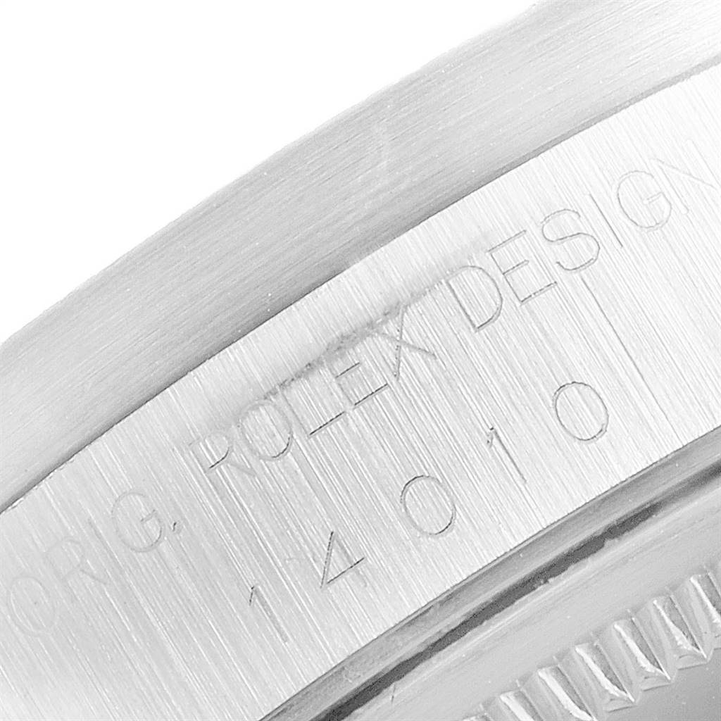 Close-up view of the case side of a Rolex Air-King 14010 Men's Stainless Steel Black Dial 14010 Men's Stainless Steel Black Dial showing engravings and design details.