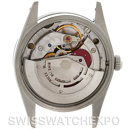 The image shows the back view of a Rolex Air-King 14010 Men's Stainless Steel Black Dial 14010 Men's Stainless Steel Black Dial watch, specifically showcasing its internal mechanical movement.