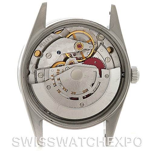 The image shows the internal mechanism of the Rolex Air-King 14010 Men's Stainless Steel Blue Dial 14010 Men's Stainless Steel Blue Dial watch from a back view, highlighting its intricate components and movement.