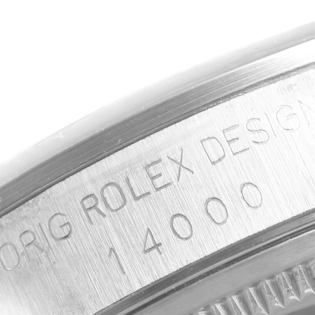 This image shows a close-up of the side of the Rolex Air-King 14000 Men's Stainless Steel Black Dial 14000 Men's Stainless Steel Black Dial watch case with engravings.