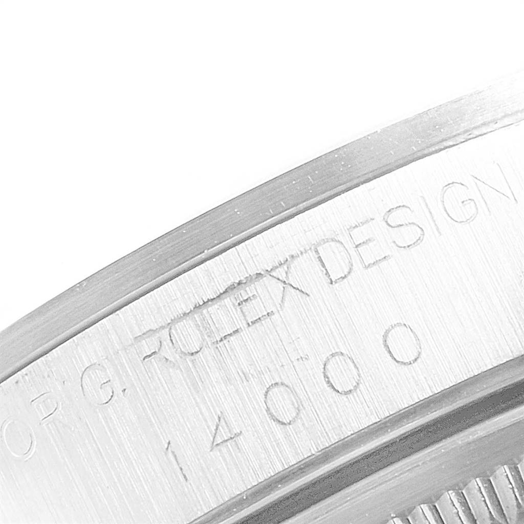 This image shows a close-up view of the engraving on the bezel of a Rolex Air-King 14000 Men's Stainless Steel Black Dial 14000 Men's Stainless Steel Black Dial model watch.
