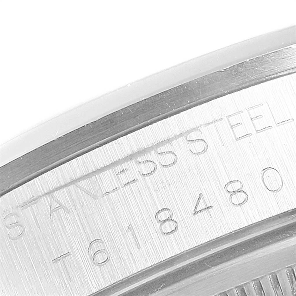 The image shows a close-up of the engraved text on the stainless steel back casing of a Rolex Air-King 14000 Men's Stainless Steel Black Dial 14000 Men's Stainless Steel Black Dial watch.