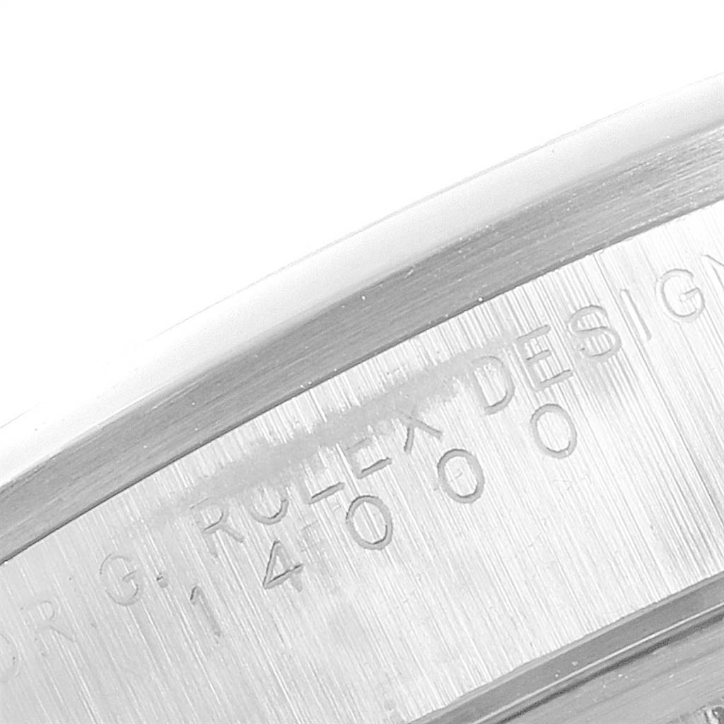 The image shows a close-up angle of the Rolex Air-King 14000 Men's Stainless Steel Black Dial 14000 Men's Stainless Steel Black Dial model's engravings on its case.