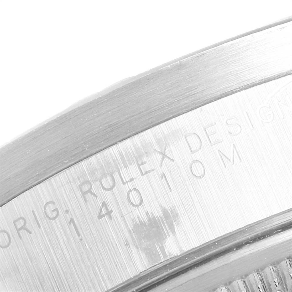 This image shows a close-up of the Rolex Air-King 14010 Men's Stainless Steel Black Dial 14010 Men's Stainless Steel Black Dial model's case back engraving.