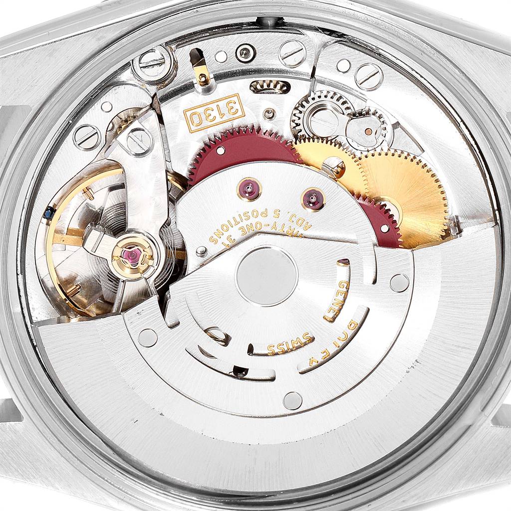 This image shows the internal mechanism of a Rolex Air-King 14010 Men's Stainless Steel Black Dial 14010 Men's Stainless Steel Black Dial watch, highlighting gears and components from a top-down angle.