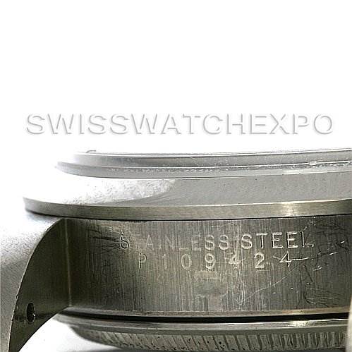 This close-up shows the side of the case and part of the bezel of the Rolex Air-King 14000 Men's Stainless Steel White Dial 14000 Men's Stainless Steel White Dial watch, along with the engraved serial number on the stainless steel.