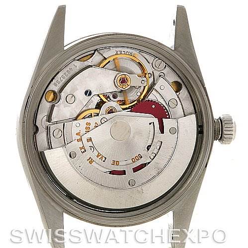 This image shows the movement and internal components of a Rolex Air-King 14000 Men's Stainless Steel White Dial 14000 Men's Stainless Steel White Dial watch from the back.