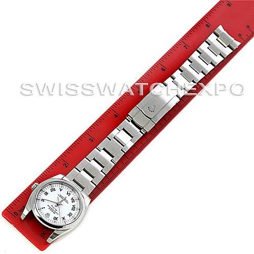 The image shows a top-down view of a Rolex Air-King 114200 Men's Stainless Steel White Dial 114200 Men's Stainless Steel White Dial watch with a ruler for scale.