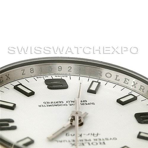 This close-up angle shows the dial and bezel of the Rolex Air-King 114200 Men's Stainless Steel White Dial 114200 Men's Stainless Steel White Dial watch, highlighting the engraved bezel details.