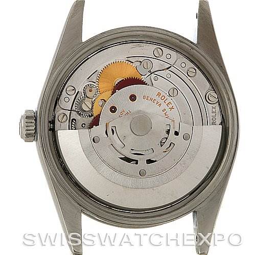 The image shows the back view of a Rolex Air-King 14000M Men's Stainless Steel Blue Dial 14000M Men's Stainless Steel Blue Dial watch, displaying its exposed mechanical movement and internal components.