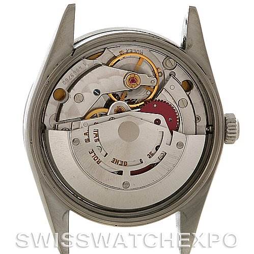 The image shows the back of a Rolex Air-King 14010 Men's Stainless Steel Blue Dial 14010 Men's Stainless Steel Blue Dial watch case, highlighting its internal mechanical movement components.