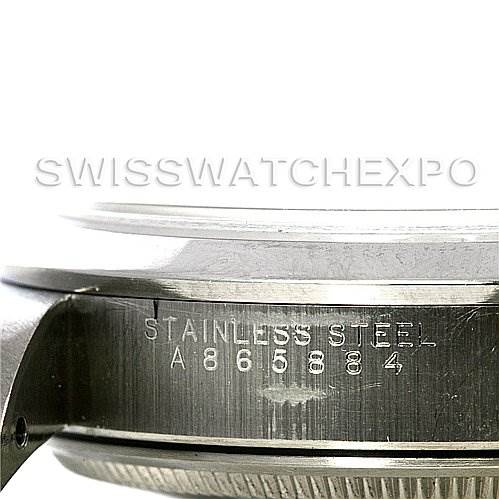 This image shows a close-up of the side of a Rolex Air-King 14000 Men's Stainless Steel Black Dial 14000 Men's Stainless Steel Black Dial watch, displaying the serial number engraved on the stainless steel case.