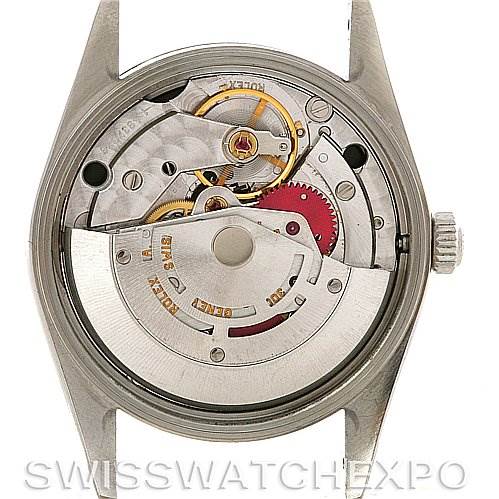 This image shows the movement mechanism of a Rolex Air-King 14000 Men's Stainless Steel Black Dial 14000 Men's Stainless Steel Black Dial watch, viewed from the back with the case opened.