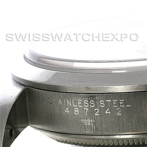 The image shows a close-up view of the side of the Rolex Air-King 14000M Men's Stainless Steel Silver Dial 14000M Men's Stainless Steel Silver Dial watch, focusing on the stainless steel casing with the model and serial number.