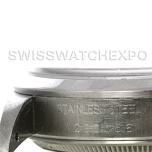 This image shows a close-up side view of the Rolex Air-King 14000 Men's Stainless Steel Blue Dial 14000 Men's Stainless Steel Blue Dial watch, focusing on the case with the "Stainless Steel" engraving.