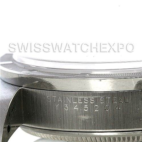 The image shows a side view of the stainless steel case and serial number of a Rolex Air-King 14010 Men's Stainless Steel Black Dial 14010 Men's Stainless Steel Black Dial watch.