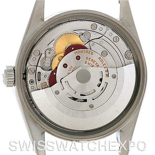 The image shows the back view of the Rolex Air-King 14010 Men's Stainless Steel Black Dial 14010 Men's Stainless Steel Black Dial watch, revealing its movement and inner mechanisms.