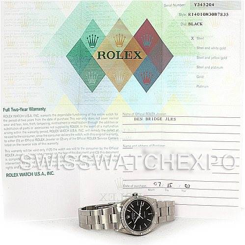 The image shows a Rolex Air-King 14010 Men's Stainless Steel Black Dial 14010 Men's Stainless Steel Black Dial watch positioned flat, along with its warranty card and documentation in the background.