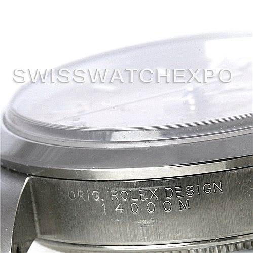 This image shows a side view of the Rolex Air-King 14000 Men's Stainless Steel Pink Dial 14000 Men's Stainless Steel Pink Dial watch, focusing on the case with "ORIG. ROLEX DESIGN 14000M" engraved.