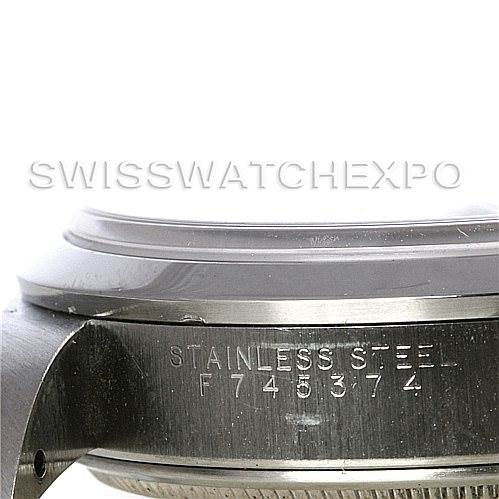 This image shows a side view of the Rolex Air-King 14000 Men's Stainless Steel Pink Dial 14000 Men's Stainless Steel Pink Dial watch, highlighting its stainless steel case and serial number.