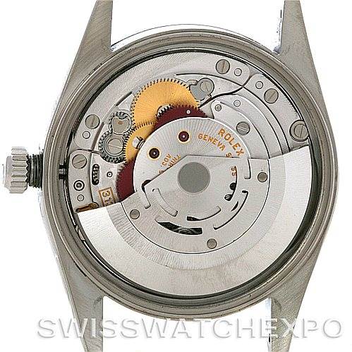 This image shows the case back removed, revealing the internal mechanism of the Rolex Air-King 14000 Men's Stainless Steel Pink Dial 14000 Men's Stainless Steel Pink Dial watch.