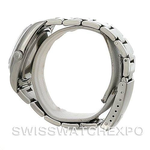 The image shows a side view of a Rolex Air-King 14000 M Men's Stainless Steel Silver Dial 14000 M Men's Stainless Steel Silver Dial watch, highlighting the bracelet, clasp, and case.