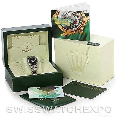 This image shows a Rolex Air-King 14000 Men's Stainless Steel Black Dial 14000 Men's Stainless Steel Black Dial watch in its box, accompanied by manuals and a branded outer box, displayed at an angle from the front.