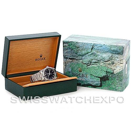 The image shows a Rolex Air-King 14000 Men's Stainless Steel Black Dial 14000 Men's Stainless Steel Black Dial watch placed inside its open green and wooden box from a front angle, with the outer box beside it.