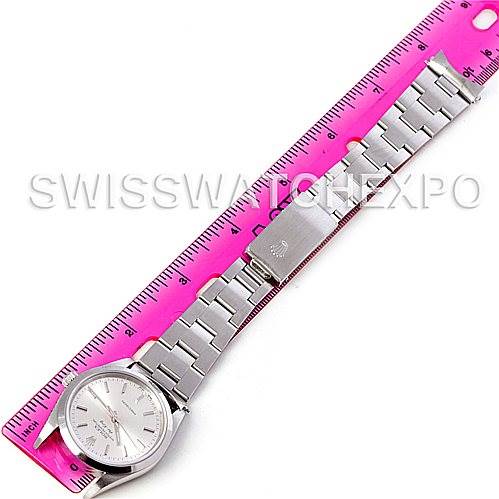 This image shows a Rolex Air-King 14000 Men's Stainless Steel Silver Dial 14000 Men's Stainless Steel Silver Dial watch laid flat next to a pink ruler, displaying its face, bracelet, and clasp.