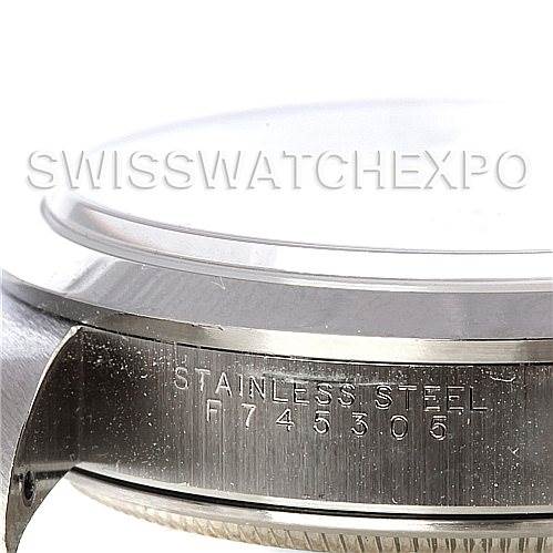 The image shows a close-up side view of the Rolex Air-King 14000 Men's Stainless Steel Silver Dial 14000 Men's Stainless Steel Silver Dial watch, focusing on the stainless steel case and serial number.
