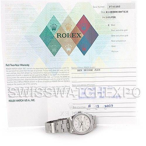The image shows a Rolex Air-King 14000 Men's Stainless Steel Silver Dial 14000 Men's Stainless Steel Silver Dial watch lying flat with its warranty card and paperwork visible in the background.