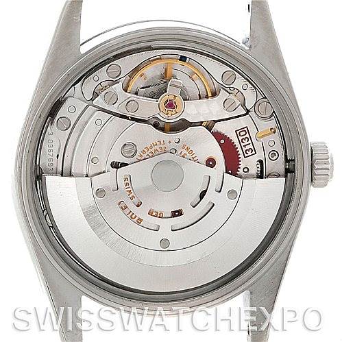 This image shows the back view of a Rolex Air-King 14000 Men's Stainless Steel Silver Dial 14000 Men's Stainless Steel Silver Dial watch, highlighting its internal mechanical movement.