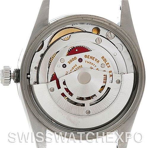 This image shows the back view of the Rolex Air-King 14010 Men's Stainless Steel White Dial 14010 Men's Stainless Steel White Dial watch, revealing its internal movement and mechanical components.