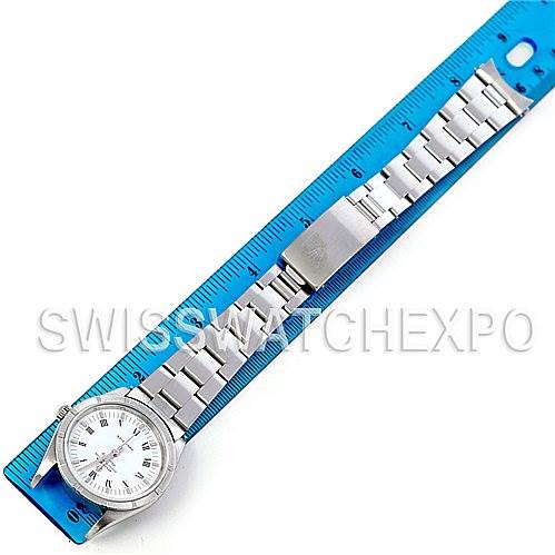 The image shows a Rolex Air-King 14010 Men's Stainless Steel White Dial 14010 Men's Stainless Steel White Dial watch laid flat next to a blue ruler, displaying its face, bracelet, and clasp.