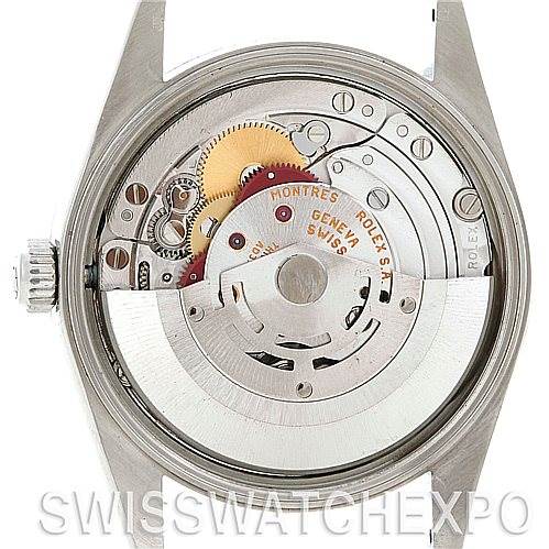 This image shows the back view of a Rolex Air-King 14010 Men's Stainless Steel White Dial 14010 Men's Stainless Steel White Dial watch, highlighting its internal mechanism and movement.