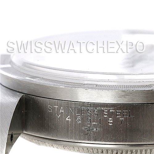 This image shows a close-up of the side of the casing of a Rolex Air-King 14010 Men's Stainless Steel White Dial 14010 Men's Stainless Steel White Dial watch, highlighting the stainless steel material and serial number.