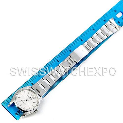 The image shows a Rolex Air-King 14000 Men's Stainless Steel Silver Dial 14000 Men's Stainless Steel Silver Dial watch laid flat next to a blue ruler, displaying the face and entire stainless steel band.